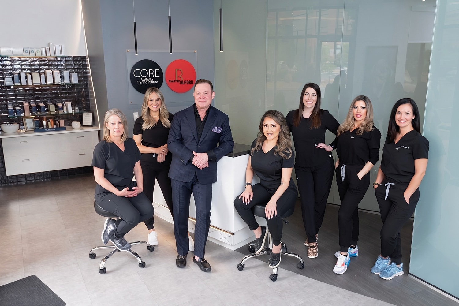 Aesthetic team in training institute setting.