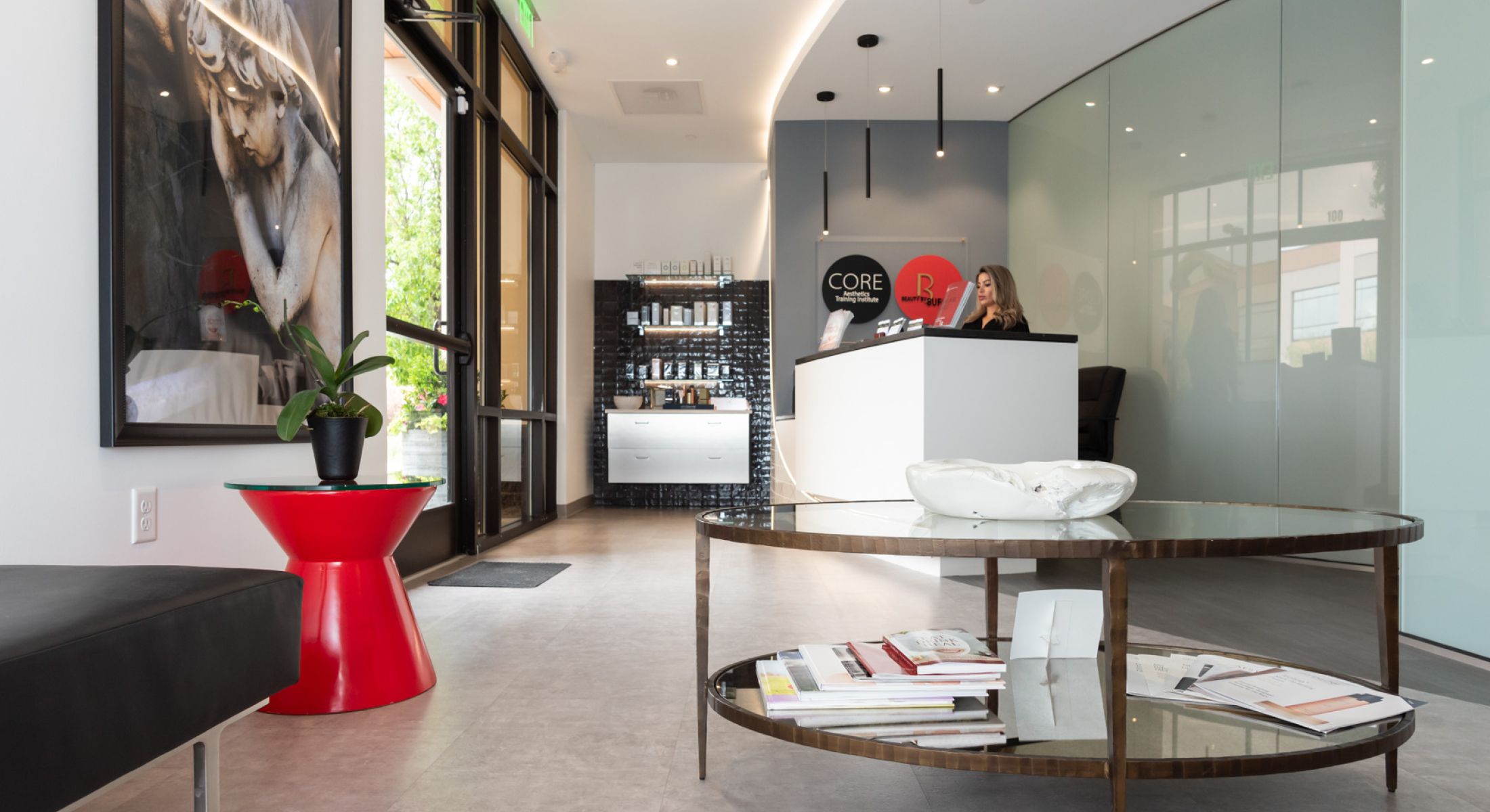 Modern reception area with stylish decor and seating.